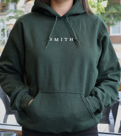 Coton ouaté vert forêt avec poche en avant et capuchon