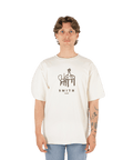 T-shirt beige table devant Smith Café x créature